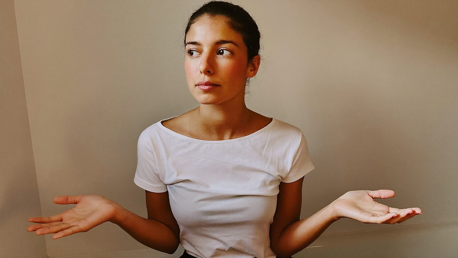 Woman with a natural, golden self-tanner glow on her face